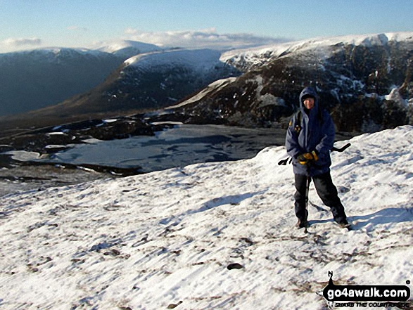 Tom on a snowy Green Hill (Glen Clova) above Loch Brandy with The Snub, Corrie of Clova and The Laird's Chamber in the background