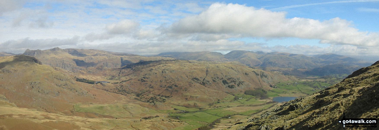 Walk c303 Swirl How and Wetherlam from Little Langdale - *Little Langdale with the Langdale Pikes, Helvellyn and Fairfield beyond from 
        Wetherlam