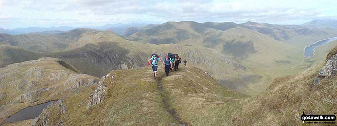 Approaching Bidein a' Choire Sheasgaich with Loch Monar far below (right)