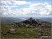 Fairfield summit cairn with Windermere in the distance