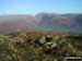 Dunmail Raise and Grasmere Village in the valley with Helvellyn (left), Fairfield (centre) and Seat Scandal, Great Rigg and Heron Pike beyond from Lang How