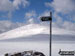 Snow clad summit of Mayar from the way marker to Glen Prosen and Glen Isla on the Kilbo Path on the Shank of Drumwhallo