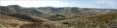 Tudhope Hill, Carlin Tooth (Teviothead), Ellson Fell, Bye Hill, Dan's Hag, Frodshaw Height, Pikethaw Hill, Wisp Hill and Comb Hill (Langhope Height) and The Mosspaul Hotel from Wether Law (Teviothead)