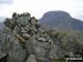 Kirk Fell summit cairn with Great Gable in the background