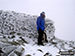 On the summit of a very snowy Scafell Pike