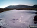 A frozen Low Water - with The Old Man of Coniston beyond