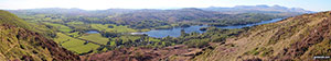 Coniston Water from the summit of Brock Barrow (Top o' Selside) with Beacon (Blawith Fells) prominent (centre) and the Coniston Fells: White Maiden, Walna Scar, Dow Crag, The Old Man of Coniston, Brim Fell, Swirl How and Wetherlam in the background (right)