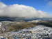 Snow on Esk Pike (left), Bow Fell (Bowfell) and Crinkle Crags (right) from the summit of Scafell Pike